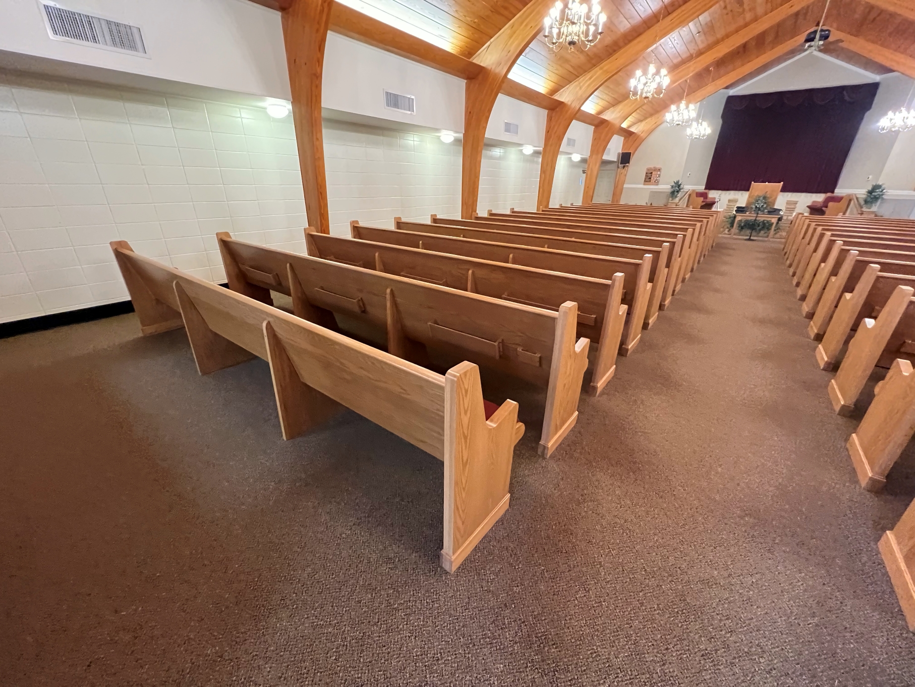 left rear view of new Kivetts pews from Woods Church Interiors installed in Woodbury, Tennessee